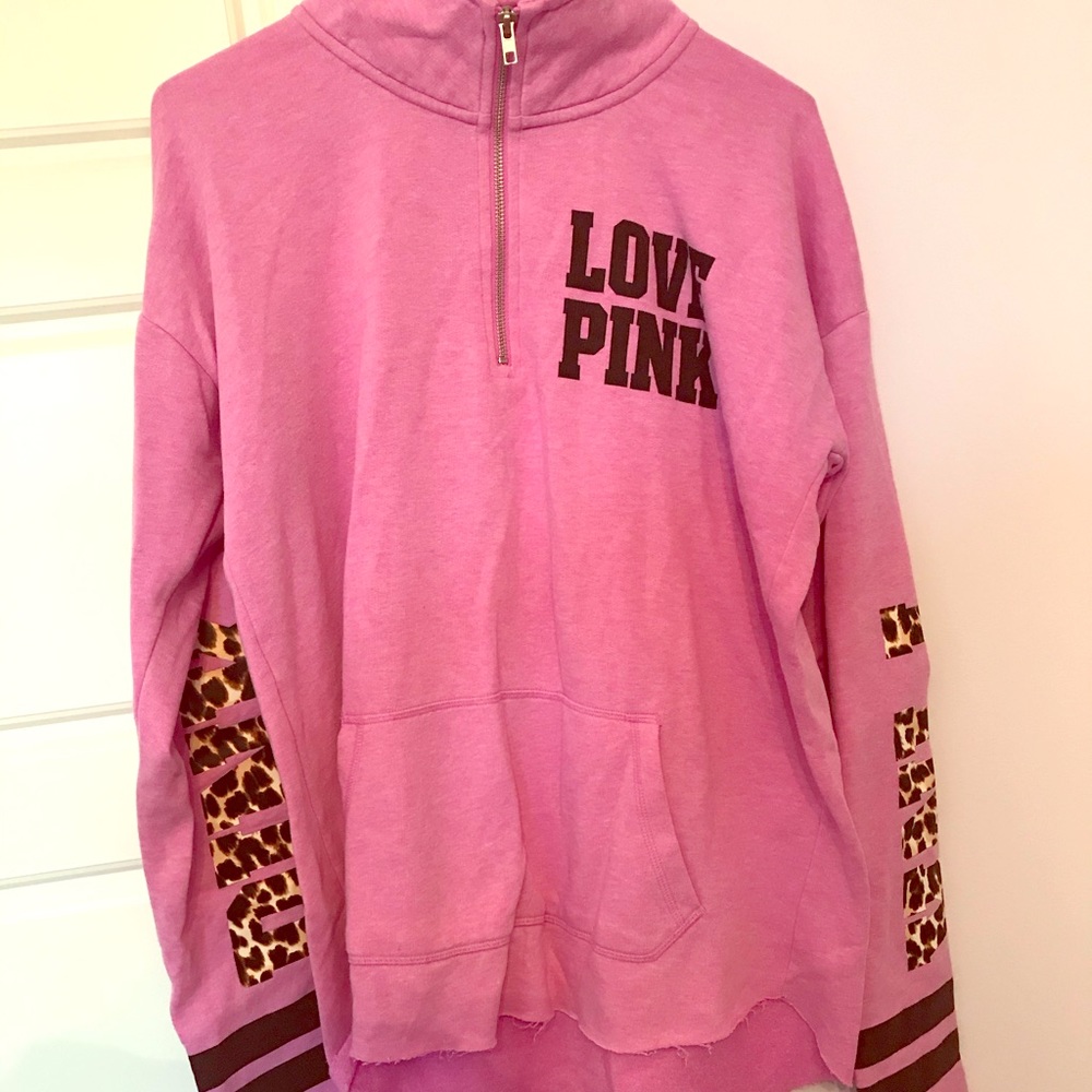 PINK half zip sweatshirt.